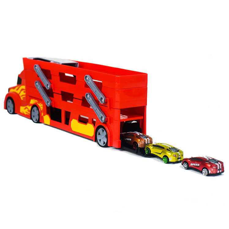 crveni veliki kamion sa auticima transporter